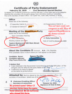 A small white dog sitting on top of a bed.